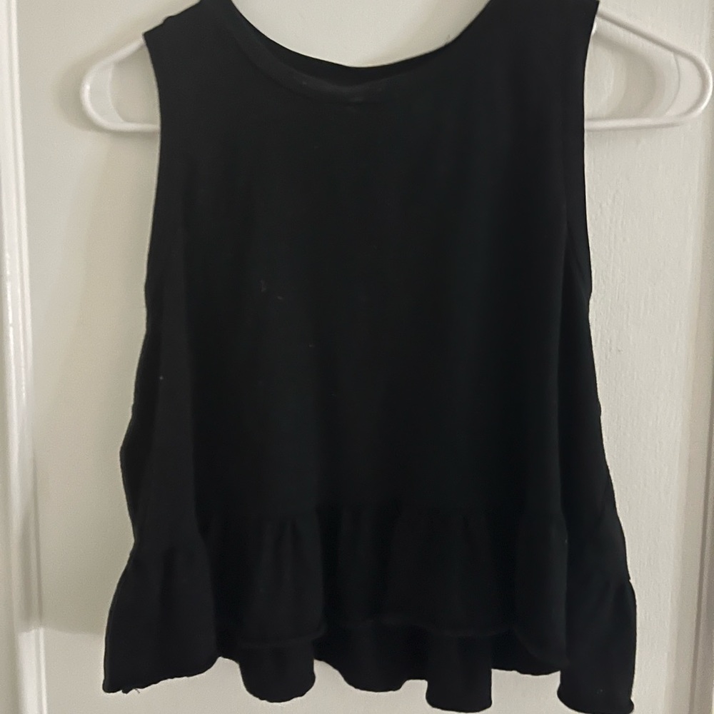 black ruffled top